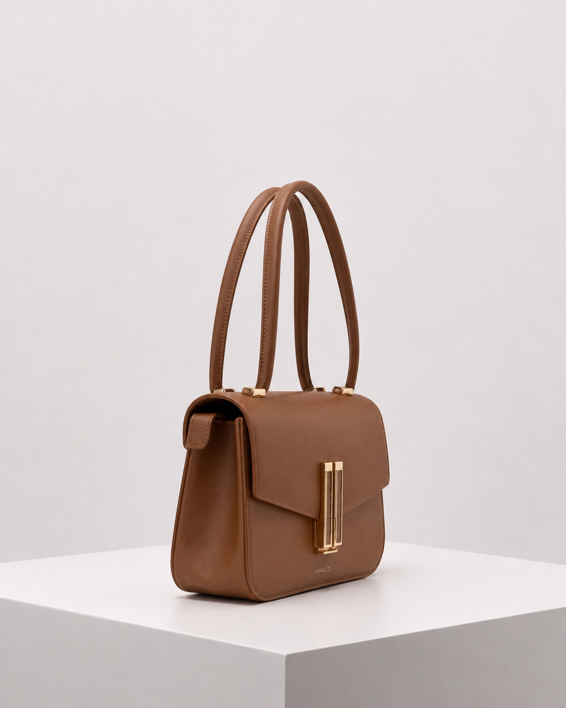 VYNCCO Sculpted Leather Top Handle Bag