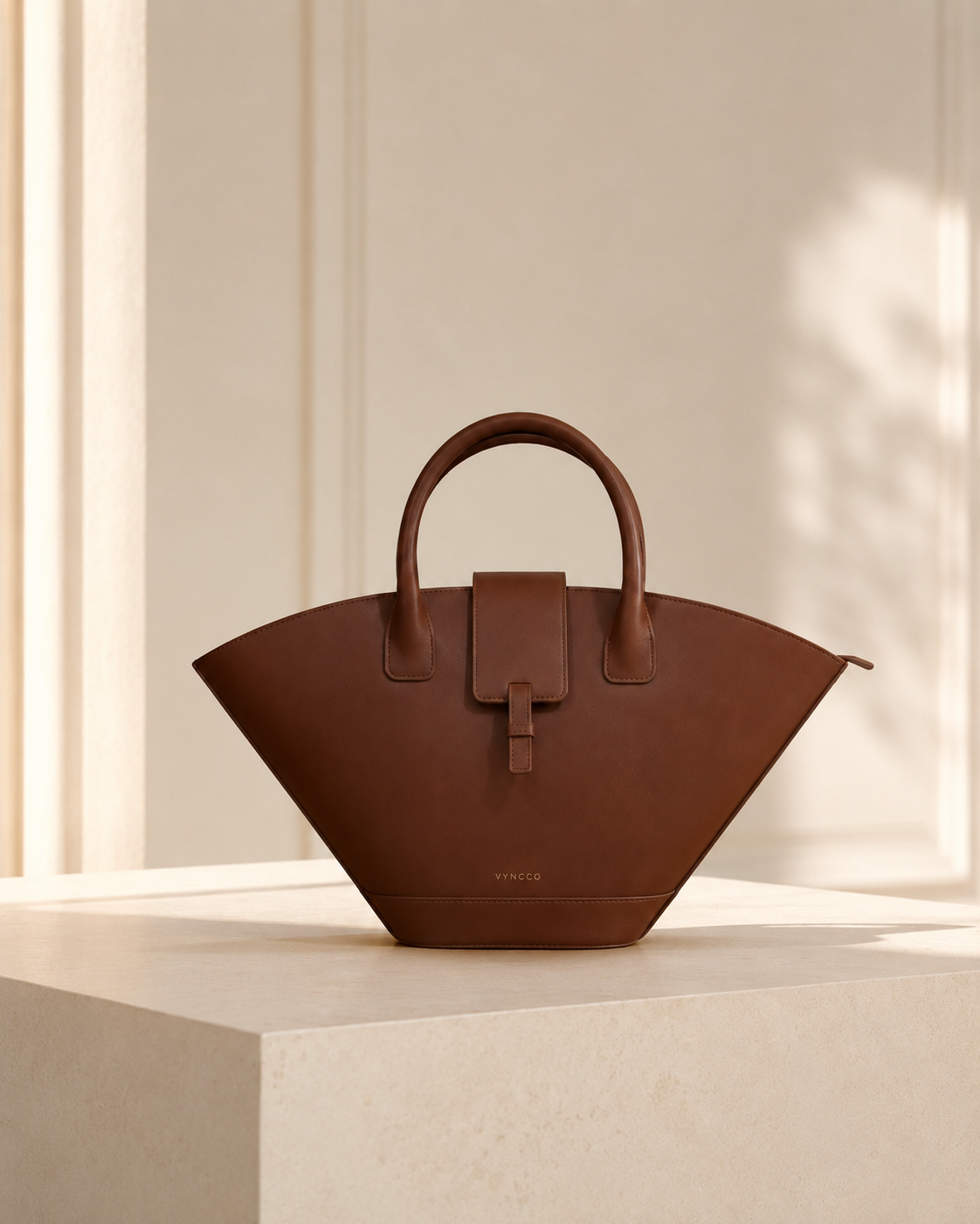 Sculpted Leather Top Handle Bag